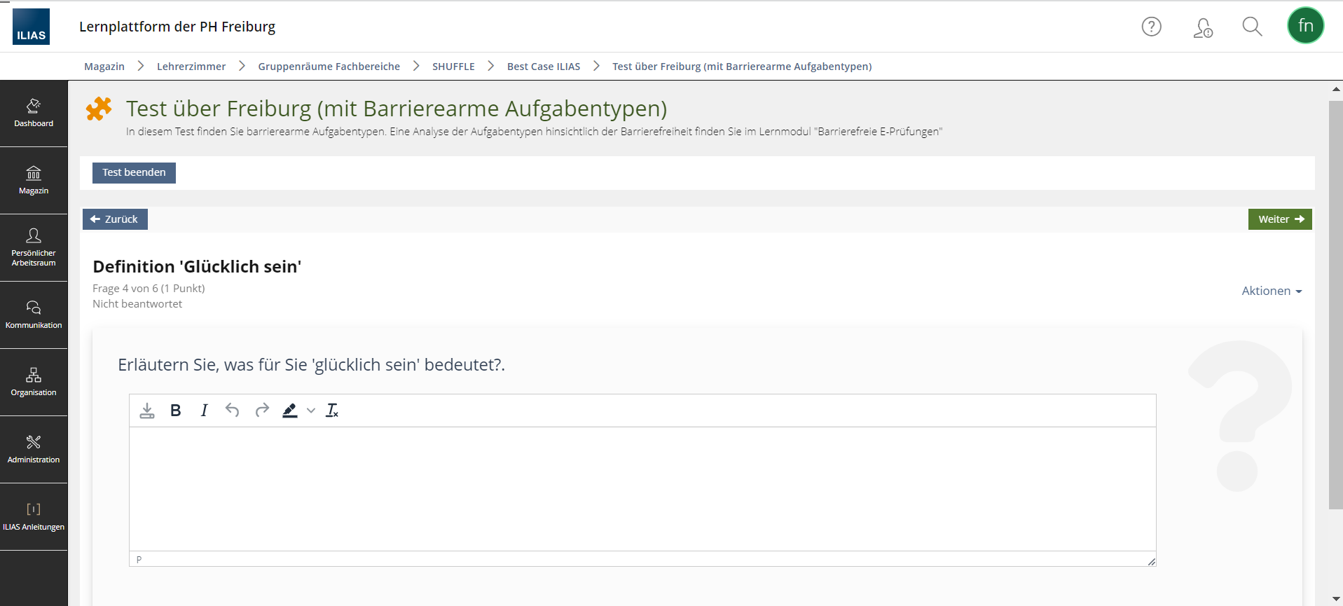 Screenshot eines Tests in ILIAS mit einer Freitextaufgabe. Die Frage lautet: Erläutern Sie, was für Sie 'glücklich sein' bedeutet.